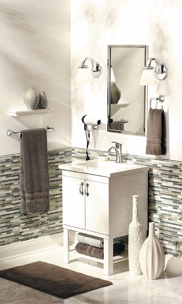 Make the most of your vertical space by adding bath accessories.